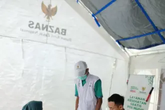 Suasana Posko Mudik BAZNAS di Kawasan Alun-alun Jatilawang