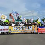 Ratusan buruh menggelar aksi dan konvoi kendaraan saat peringatan May Day 2026 di Alun-alun Cilacap. (Faiz Ardani).