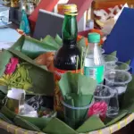 Minuman Khusus dalam Sesaji Memetri Bumi di Maos Kidul Cilacap. (Dok).