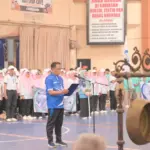 Ketua MKKS Cup X saat membacakan laporan