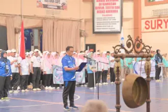 Ketua MKKS Cup X saat membacakan laporan
